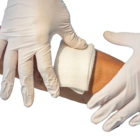 Friendly healthcare professional delivering collagen dressing at home service in Dadar